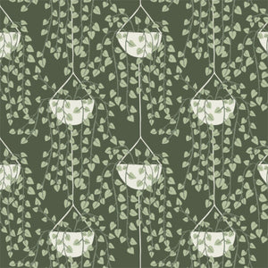 Strings of heart-shaped leaves fall from hanging white pots on a Dark Green background. From the Planted Collection by Betsy Siber for Cloud9. 100% Cotton, 44" wide.