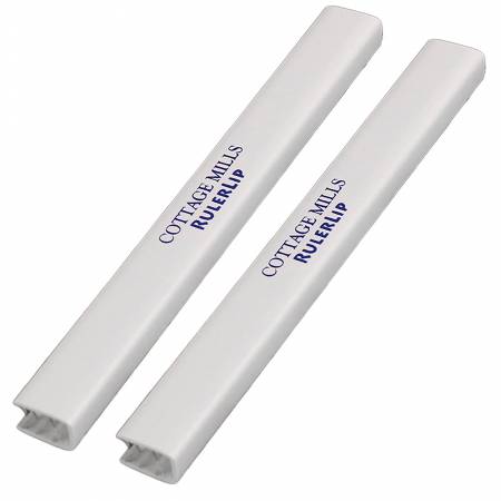 RulerLip slips onto the end of most 1/8” thick acrylic rulers turning them into a T-Square. Lip rides along edge of cutting mat stabilizing ruler and preventing slipping while cutting. Can be used on a variety of ruler sizes and can also be used to connect rulers. Package contain two 6” RulerLips. To remove simply pull it off.