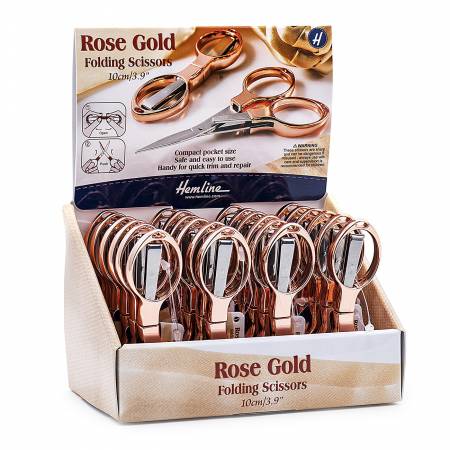 10cm / 3.9in full metal folding scissors. Compact pocket size handy for travelling. Safe and easy and use. Handy for quick trim and repair. - Item dimensions: 13.5 x 8.2 x 8.5 cm (5.3in x 3.2in x 3.3in) - Item gross weight: 720g (1.60lb)  Color: Pink Made of: Metal Scissors and Paper Display Size: 5.3in x 3.2in x 3.3in Included: 24 Scissors and Store Display