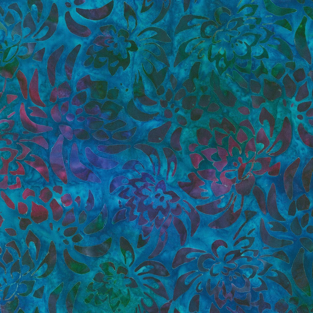 This fabric from Robert Kaufman is a batik with deep turquoise, purple, navy and a little bit of light teal. This batik has a beautiful variation of hues.