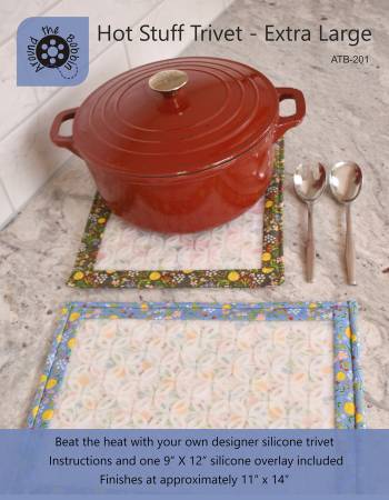 Create an extra large designer silicone trivet with your favorite fabrics. This extra large trivet looks beautiful in the center of a table and is great for large platters and casserole dishes. Translucent 9 x 12 silicone overlay and instructions included. Finished trivet measures approx. 11 in x 14 in Silicone overlay is 100% food grade silicone and heat resistant up to 450 degrees. Refill silicone overlays are available.