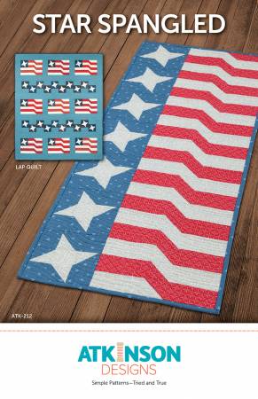 The flags are floating in the breeze - the points are floating too! Pattern includes a table runner, lap quilt, and place mats. Table Runner: 16" x 37.25" Lap Quilt: 63" x 75" Place Mat: 16" x 11"
