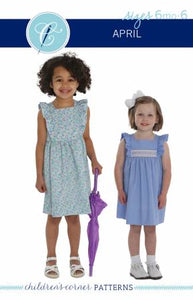 April is a dress perfect for May flowers inspired by the vintage pinafore. The bodice is framed with gentle ruffles and can be made with a smocked insert (View B). Unlike the traditional pinafore, April has a lined bodice, so it can be worn on its own while maintaining modesty. The back bodice has a wrap-around facing for a couture finish. The dress closes in the back with buttons, has a continuous bound placket, and can be made with an optional sash.