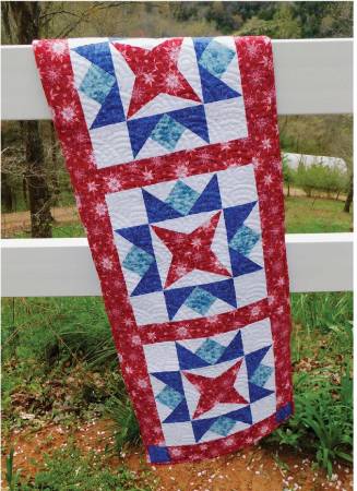 The center of the Liberty Runner is designed with blocks sewn with the Creative Grids Kitty Cornered Tool. Adding a modified version of flying geese showcases them beautifully. Change the colorway to create this generous-sized table runner for any occasion.