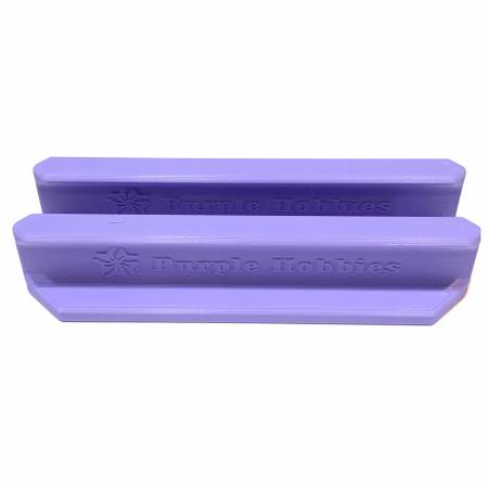 Protect your fingers from rotary blades! Position your fingers behind the ruler handle to keep them safe from rotary cutter accidents. 