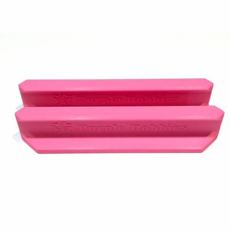 Protect your fingers from rotary blades! Position your fingers behind the ruler handle to keep them safe from rotary cutter accidents. 