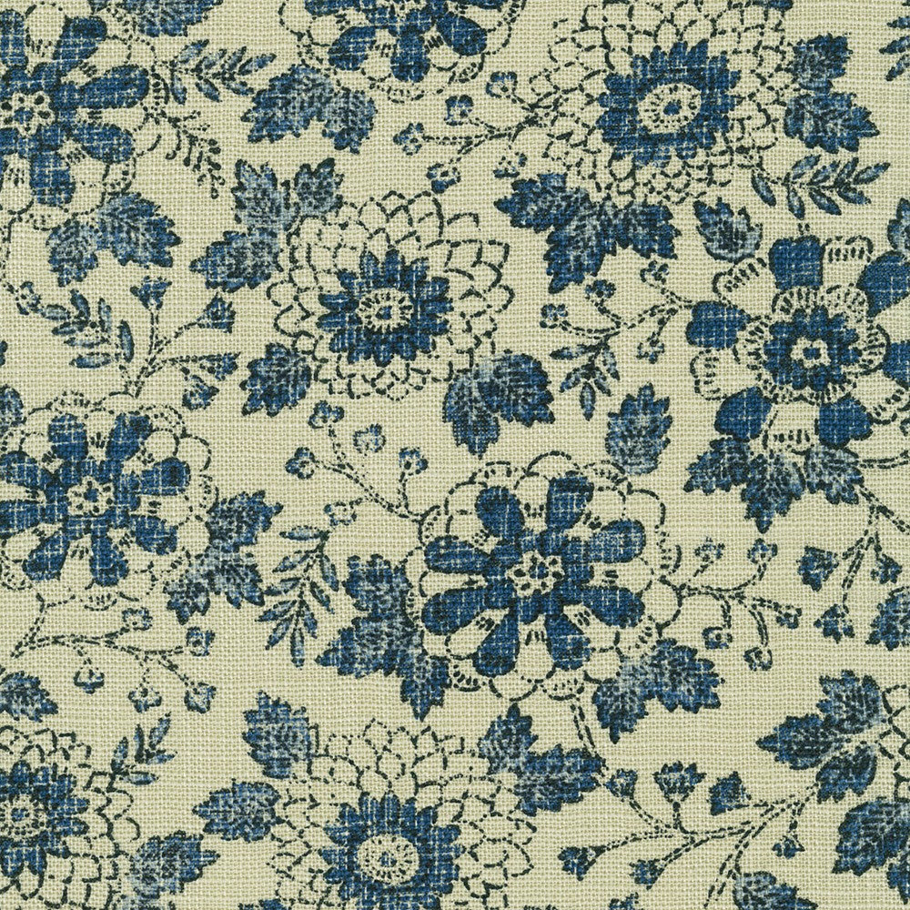 This beautiful textured fabric is by Sevenberry for Robert Kaufman Fabrics. It features navy blue leaves and flowers on a beige natural background. This fabric has a texture that makes it feel like a flax linen, but is 100% cotton!