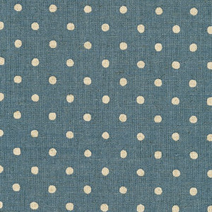 This beautiful fabric is a mix of cotton and flax. This gives it a textured hand and more natural appearance. The fabric is a blue background with white polka dots all over. This fabric would be great for bags, clothing, pillows, etc. 