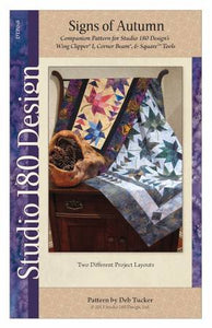 This pattern is from Studio 180 Design and was designed by Deb Tucker. This duo, wall quilt and table runner are certain to enhance the look of your fall decor. Both projects include a favorite leaf block and flying geese strips to create their overall design, and both are perfect scrap projects. Deb's Wing Clipper I and Corner Beam tools ensure perfect units for easy quilt construction and so all you need to do is add those beautiful fabrics.&nbsp;