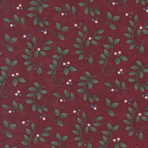 This fabric is a deep maroon with leaf swirls and white little berries. Beautiful winter fabric 100% Cotton, 44/5"