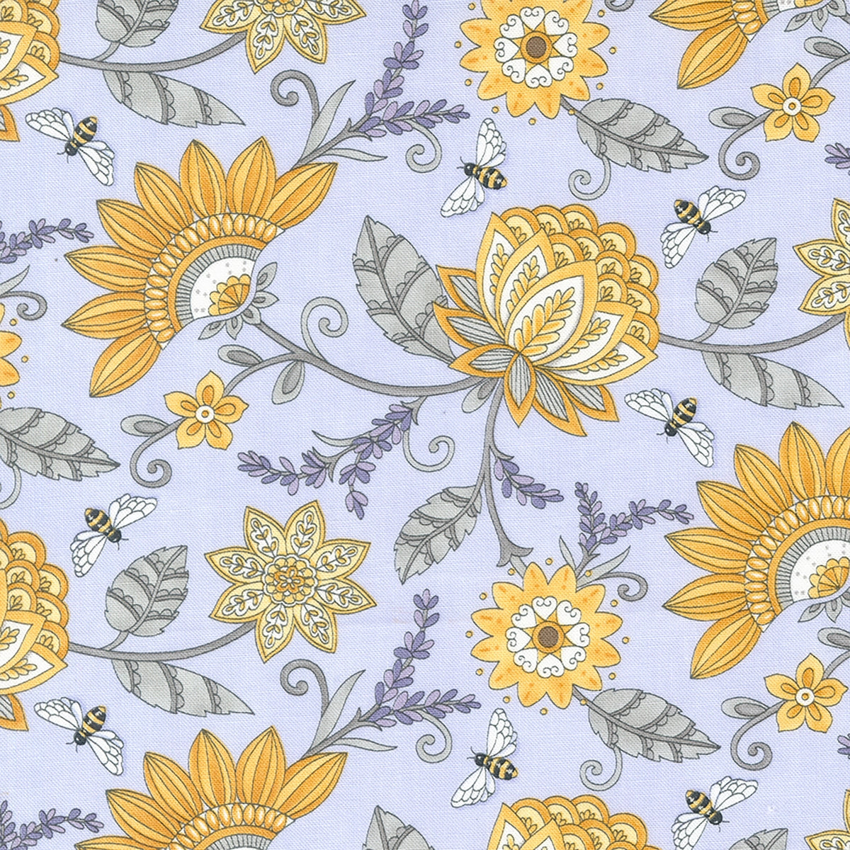 This collection is full of bees! With the Honey & Lavender fabric collection by Deb Strain for Moda Fabrics, transport yourself to a dreamy garden filled with buzzing bees and fragrant lavender fields. This fabric is a light lavender color with flowers and bees floating around. 