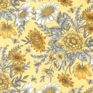 This collection is full of bees! With the Honey & Lavender fabric collection by Deb Strain for Moda Fabrics, transport yourself to a dreamy garden filled with buzzing bees and fragrant lavender fields. The collection features a soft color palette of lavender, purple, and yellow, adorned with delicate floral patterns, damask motifs, and charming gingham checks. This fabric presents an array of ornate yellow florals and gray leaves on a warm yellow background.