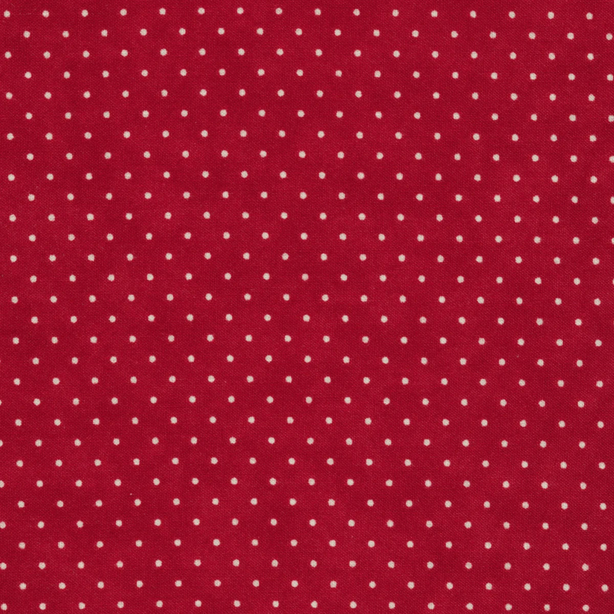 This fabric is a cranberry red with beige dots on top. Great fabric to use as a blender. 100% Cotton, 44/5"