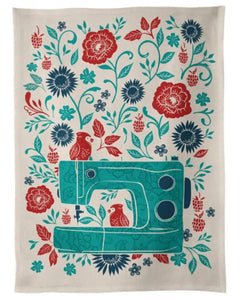 This tea towel is designed by Sarah Watts. Sewing machine with birds and flowers. Use them in the kitchen or frame them.  100% Cotton  Size: 18" x 24"