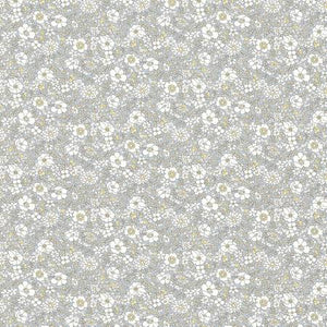 This floral Liberty of London Fabric is covered in small white flowers with a yellow center over a light grey background. This fabric is quilting cotton weight but would also be great for any other kinds of sewing projects! By Riley Blake Designs