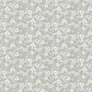 This floral Liberty of London Fabric is covered in small white flowers with a yellow center over a light grey background. This fabric is quilting cotton weight but would also be great for any other kinds of sewing projects! By Riley Blake Designs