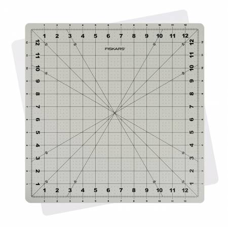 Our Rotating Cutting Mat makes squaring off large quilting blocks up to 12.5in or cutting out appliqué quicker and more convenient. It features a self-healing mat with an easy-to-read measuring grid, plus bias lines to make accurate shape cutting hassle-free.
