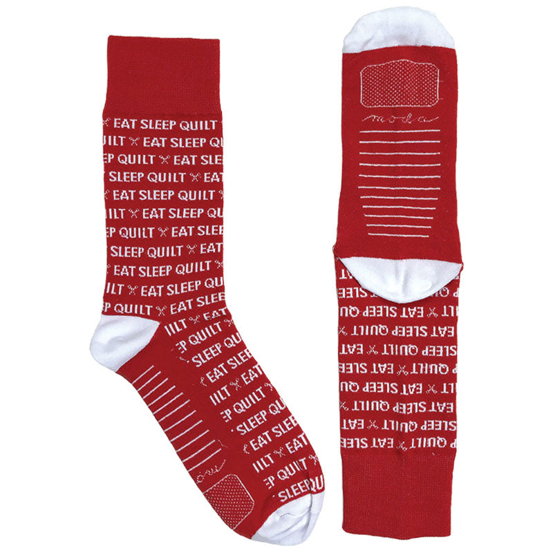 Red with white lettering.  Super soft, one size fits most socks. Made from 75% cotton, 23% nylon, and 2% spandex.