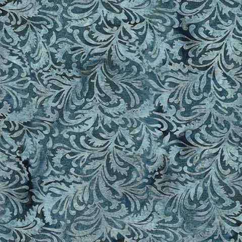 This batik is dusty navy blue with a light dusty blue scroll design on top. There are hints of grey and brown in it, but you have to look very closely to see them! Soft print with color variation throughout. 