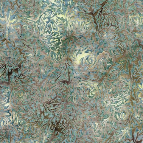This batik is grey, brown and blue with white throughout with a leafy design on top. The variation adds to interest and visual depth. Beautiful colors that work for many different projects!