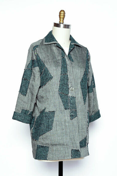 Chicago Jacket Unlined jacket has curved waist seams, diagonal front darted seams with pocket openings. Center front darts shape the narrow lapels leading to turn-down collar. Raglan sleeves blend into short curved shoulder seams. Narrow stitched hems, one-button closure. Wrong side of fabric shows.  Share your finished garments on Instagram with #swchicagojacket  Sizes XS, S, M, L, XL, XXL. View our Measurement Chart.