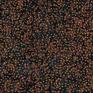 This batik has brown swirls on top of a deep navy-blue background with some variation in hue, topped with golden dots! Love how batiks show variation in the color saturation due to the dying process. Perfect for quilting, clothing and crafting.