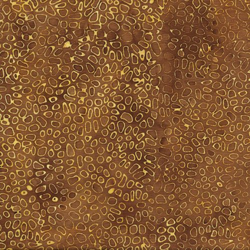 This batik resembles cheerios, hence the name! It is a pretty brown color with golden shape outlines on top. Almost looks like a Gustav Klimt painting! Perfect for quilting, clothing and crafting.