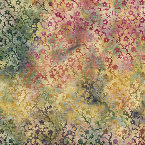 This batik has so many different colors in it! A muted rainbow tie dye effect on the background with tiny flowers on top. Perfect for quilting, clothing and crafting.