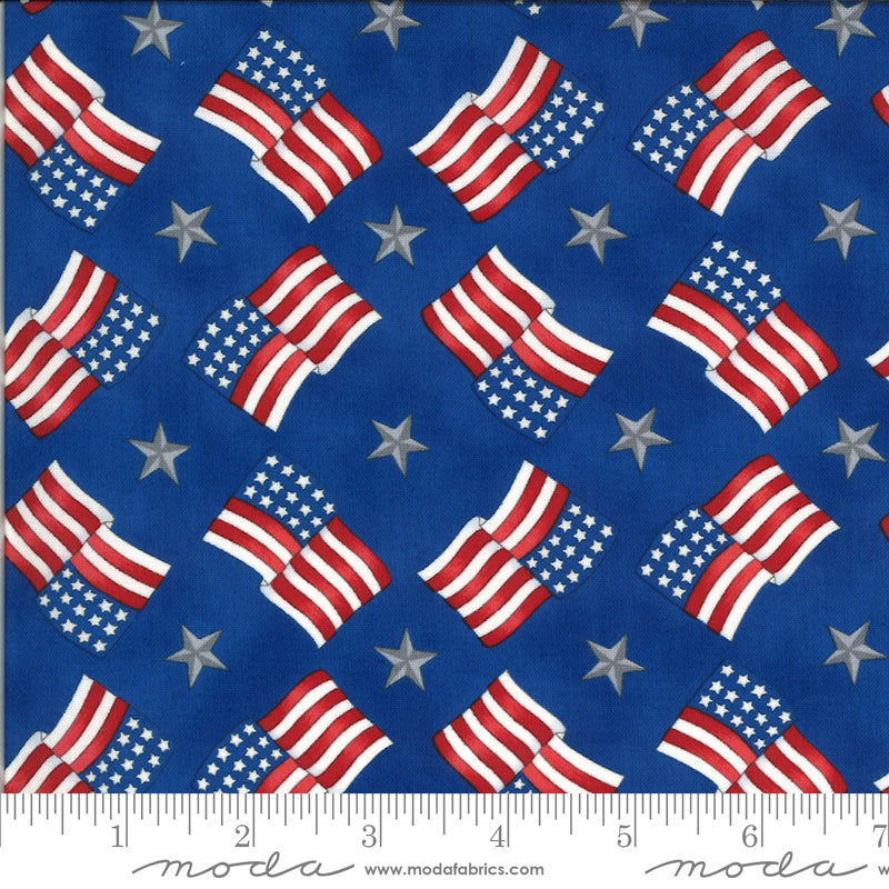 American flags and silver stars on a blue background by Deb Strain from the America Beautiful Collection for Moda Fabrics.   100% Cotton, 44/5"