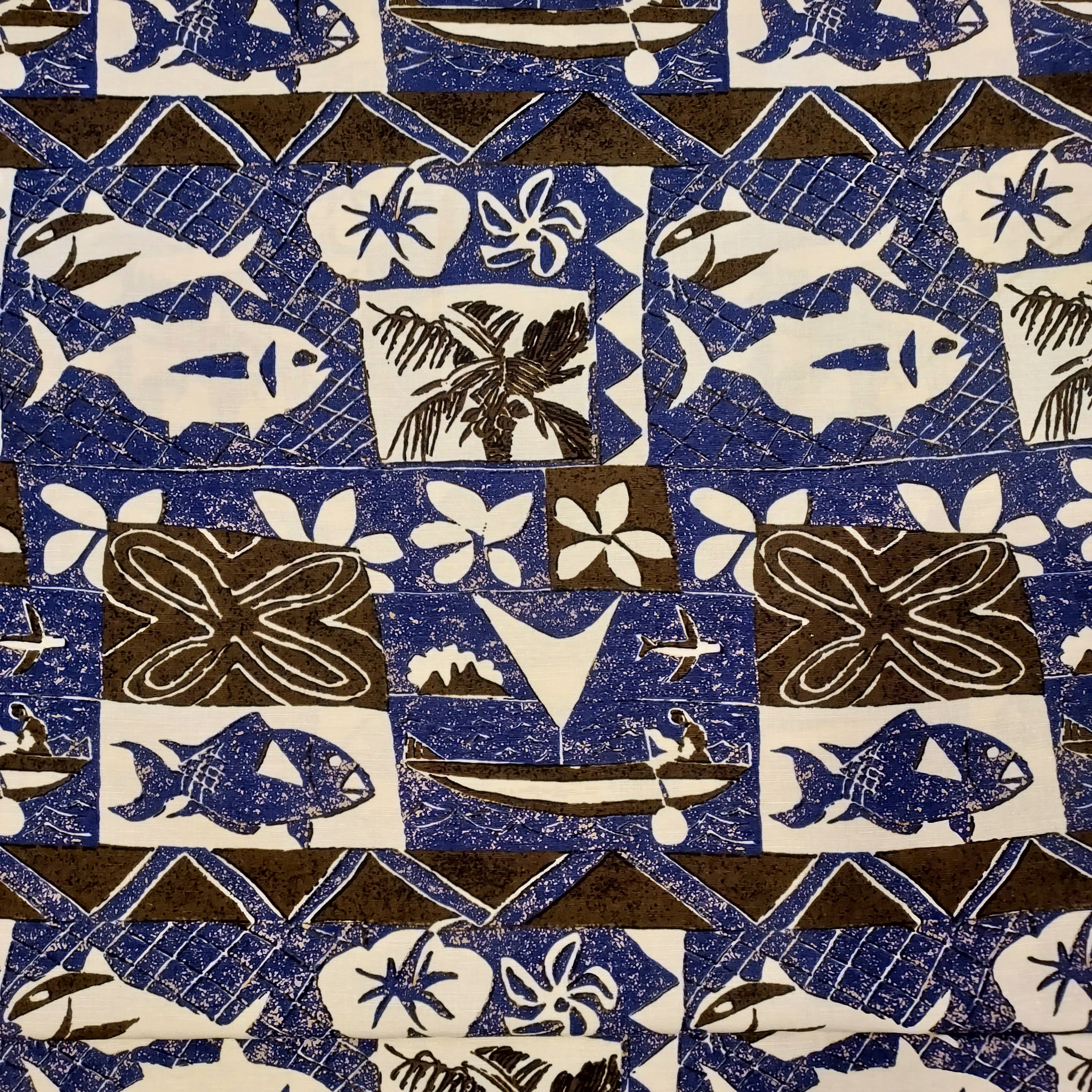 This fabric would make the best hawaiian shirt!  ©Kahala fabric it is full of island inspired images in browns, blues and whites. The block printing gives it texture! Make your next summer outfit with this pretty fabric. 