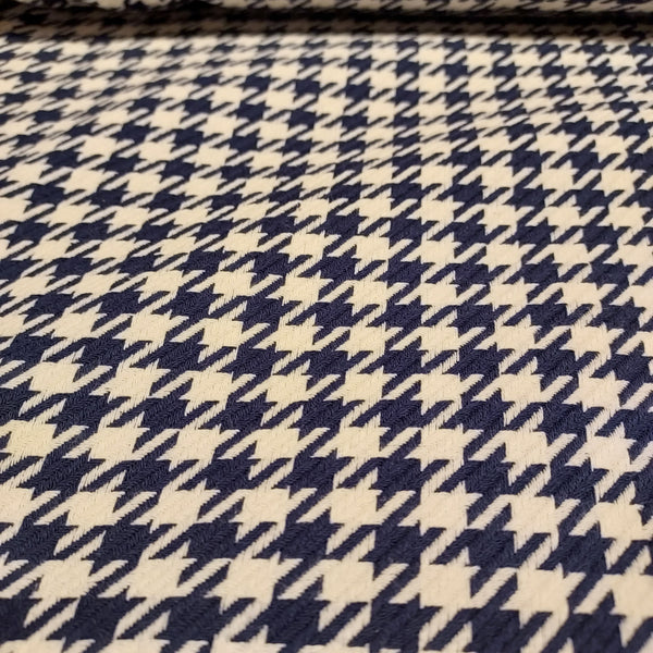 Textured yarn dye houndstooth consists of navy and white. This fabric would make a lovely garment. Suiting/heavy weight fabric.   100% Cotton, 60" wide