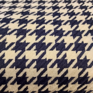 Textured yarn dye houndstooth consists of navy and white. This fabric would make a lovely garment. Suiting/heavy weight fabric.   100% Cotton, 60" wide