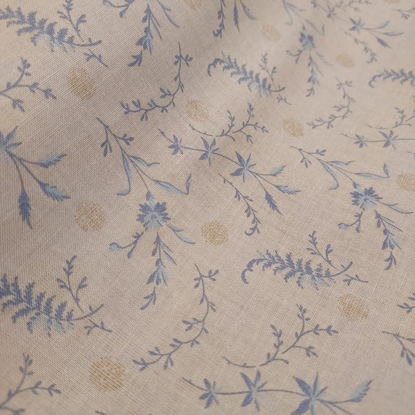  This beautiful cotton fabric is made in Japan. Super soft hand and lightweight feel, this fabric has blue ferns and leaves on it as well as small tan dots. Beautiful fabric for clothing or quilting.