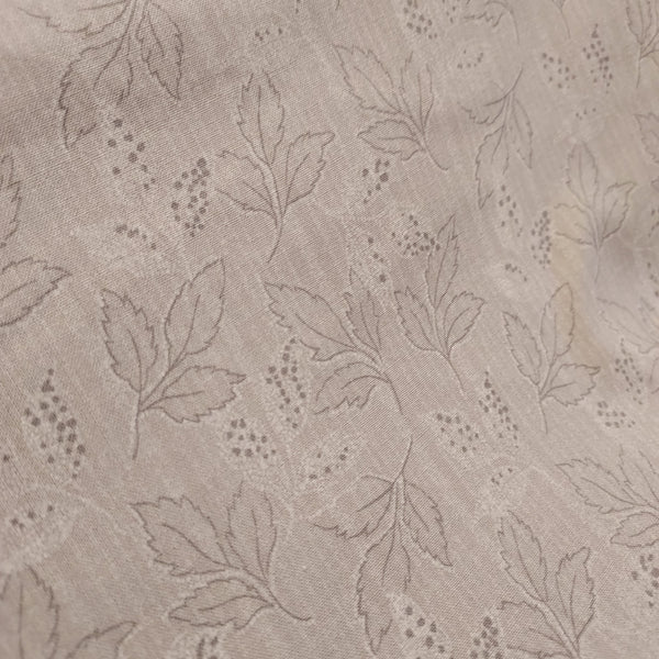  This beautiful cotton fabric is made in Japan. Super soft hand and lightweight feel, this fabric has blue ferns and leaves on it as well as small tan dots. Beautiful fabric for clothing or quilting.