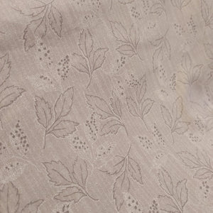  This beautiful cotton fabric is made in Japan. Super soft hand and lightweight feel, this fabric has blue ferns and leaves on it as well as small tan dots. Beautiful fabric for clothing or quilting.
