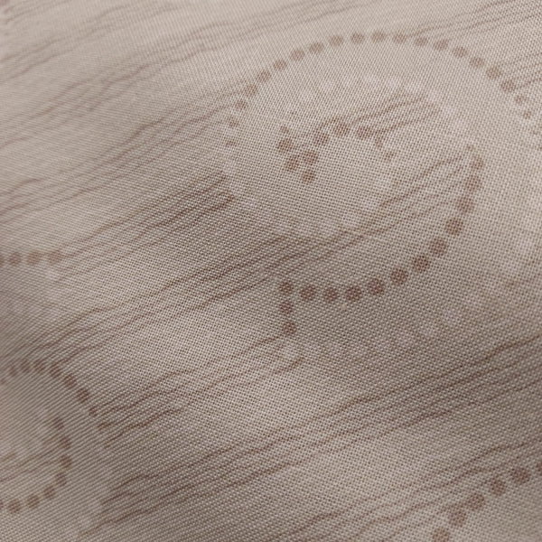  This beautiful cotton fabric is made in Japan. Super soft hand and lightweight feel, this fabric has beige swirls outlined with white and tan dots on top of a beige background. This tan color has a little bit of a green tint to it. Beautiful fabric for clothing or quilting.