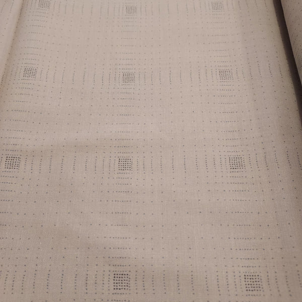 This beautiful cotton fabric is made in Japan. Soft hand and lightweight feel, this fabric has dark brown dots all over the fabric that form a grid. These dots are in a square cluster and disperse throughout. The tiny dots are over a taupe background. This fabric is beautiful and would be suitable for quilting or apparel sewing. 