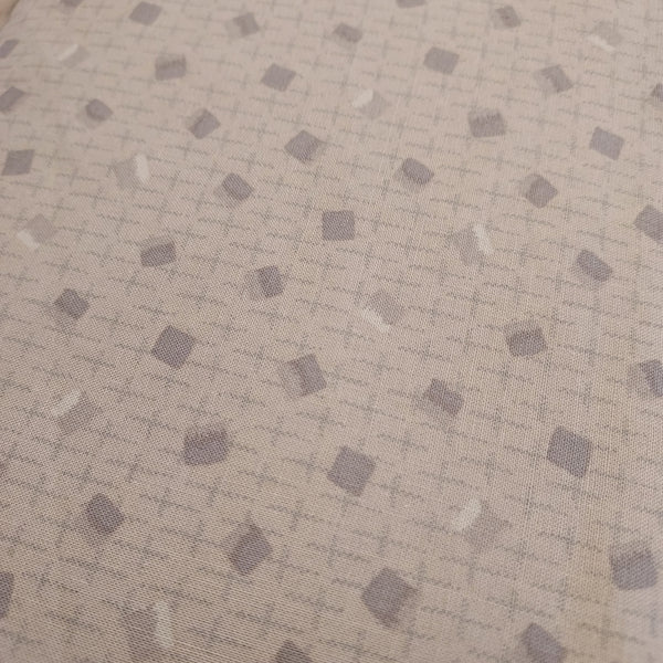 This beautiful cotton fabric is made in Japan. Soft hand and lightweight feel, this fabric has brown squares tossed all over a taupe background with crosses. This fabric is beautiful and would be suitable for quilting or apparel sewing.  Variant style (CE10469S-A)