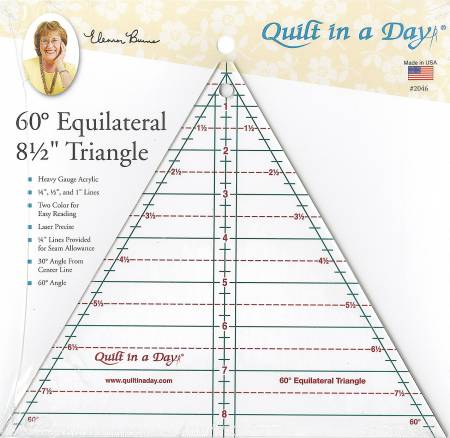 8-1/2in Heavy Gauge Acrylic. 1/4in, 1/2in, and 1in lines. Two Color for Easy Reading. Laser Precise. 1/4in Lines Provided for Seam Allowance. 30 degree Angle from Center Line. 60 degree Angle equilateral triangle.  The 60 Degree Triangle Ruler is perfect for making any pattern that requires 60 degree angles. It is perfect for making a Thousand Pyramids Quilt or the Basket for Eleanor's current Block Party, Quilts from Eleanor's Attic. The Ruler is laser cut for precision and has clear and concise markings.