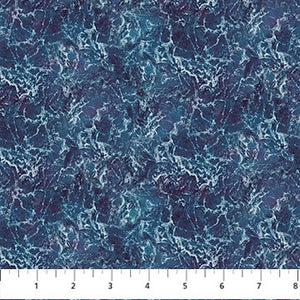 This dark blue ocean fabric is covered in a deep blue sea print. There are white caps and lots of visual texture in this fabric. Would be a great alternative to a solid for a nautical quilt! 
