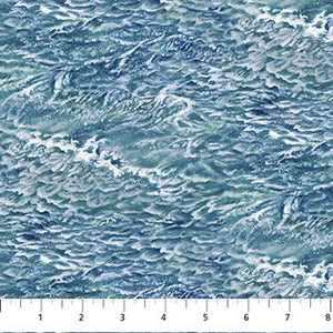 This light blue ocean print is covered in waves, white caps, ocean spray and some dark shadows from the waves. This fabric has a lot of visual texture and would be a great alternative to a solid for a nautical quilt! 