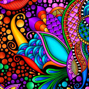 Bold and bright, uplifting and hypnotic, these prints combine for a dynamic collection in prismatic color. Accented with black, the color pops and the detailed artwork shines. These vivid fabrics are perfect for eye–catching quilts, accessories and home décor. © Debi Payne.