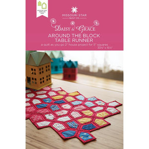 You'll want to invite the entire neighborhood over for dinner once you've completed this cute quilt as you go house table runner. It's comprised of cleverly pieced houses for a geometric effect. To begin, you'll need one package of 5" squares, 1 1/4 yards of backing, and two packages of Daisy & Grace Quilt As You Go batting shapes (if desired) or use up all your batting scraps!  Finished size: 33 1/8" x 15 1/4" Pattern for 5" Squares.