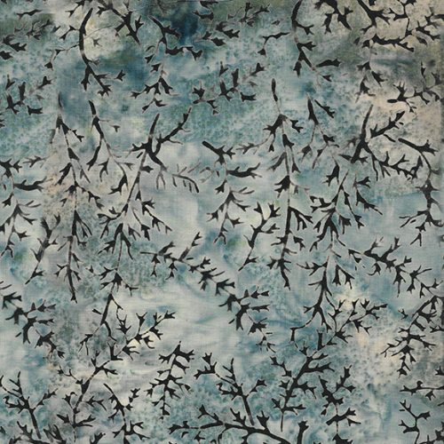 Black branches on a grey blue stone background. This fabric almost has a distressed appearance.   - 100% cotton 