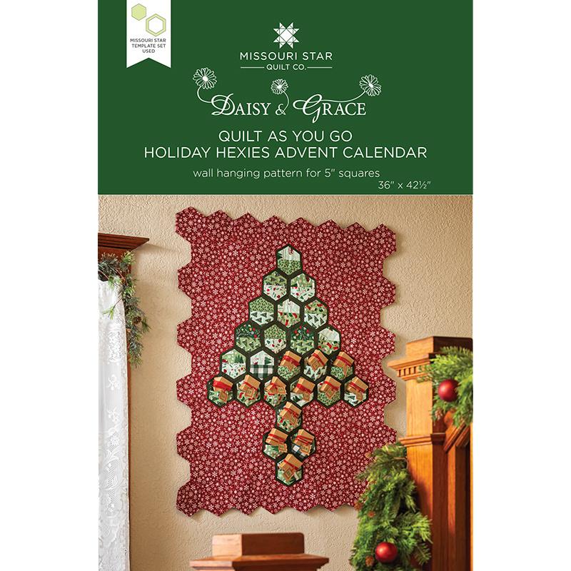 Make your Christmas countdown magical with a unique hexagon Advent calendar. This easy quilt as you go pattern creates a festive Christmas tree shape out of individual hexagons made with tiny pockets to hold gifts, treats, or messages for each day. Begin with three packages of print 5" squares, add 1 3/4 yards of coordinating backing, 1 yard of green backing, and batting. When you're finished sewing, you're all through! No need to quilt or bind.  Finished size: 36" x 42 1/2" Pattern for 5" Squares.