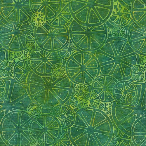 This batik is a lime green/yellow citrus print on top of a green background. There are many different sizes of citrus slices that make up this toss. 