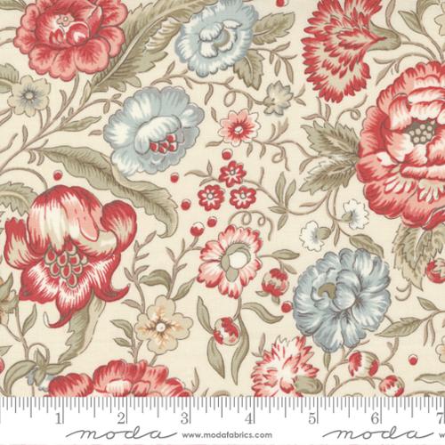 This fabric is covered in red and blue flowers with green leaves over a beige background. This fabric is a traditional design and has 2 other coordinating fabrics from the same collection.