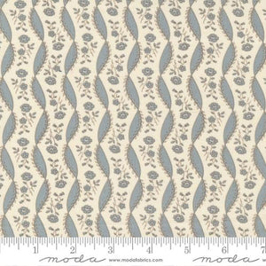 This fabric is covered in traditional little blue flowers with blue ribbon vertical stripes. This design is over an ivory background. 
