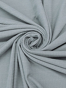 This super soft polyester/lycra knit is perfect for sweaters and sweatshirts. Power Fleece Knit, opaque, very Soft, thin Hand, breathable and Moisture Wicking. 56" wide. 