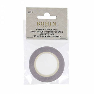 Bohin Double Face Adhesive Tape, 1/4 in. wide x 8 yards. For medium and heavy fabric, this double sided adhesive tape can be sewn through without gumming up your needle. Perfect for holding together seams, hems, edges etc. before stitching. Can be used on clothing; great for home, sewing or crafting.